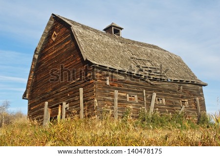 old abandoned barn in the morning in fall
