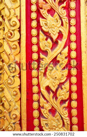 Frame with Thai art wall pattern in temple