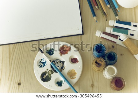painting set on wood table process with vintage style