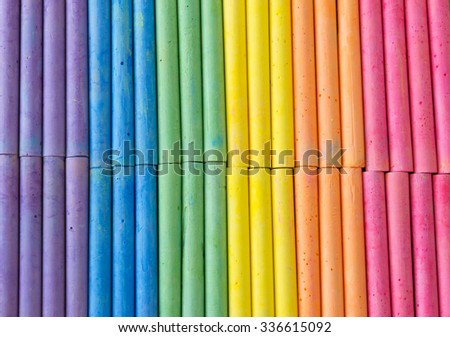 colorful chalk put in rainbow shade ,purple ,blue ,green ,yellow ,orange and pink