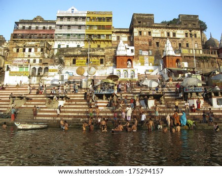 VARANASI, INDIA - 26 MARCH: People wade in water during a religious ceremony at Uttar Pradesh on March 26, 2006 in Varanasi, India