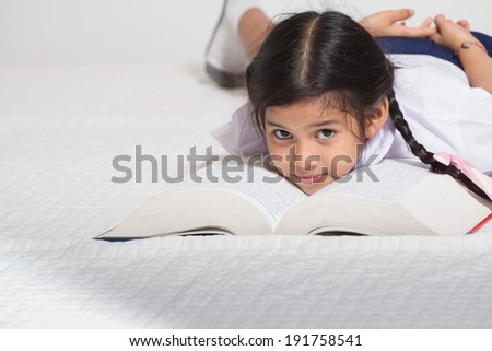 Student sleep on book