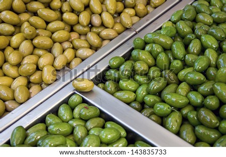 The counter with fresh and pickled olives.
