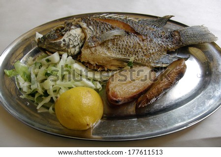 St. Peters fish, a typical meal for christian pilgrims by sea of Galilee.