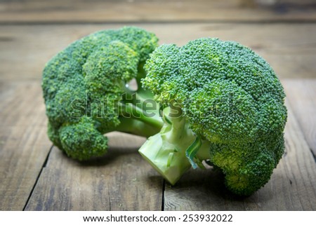 green broccoli on wooden