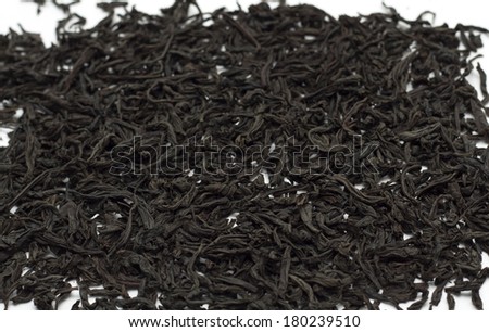 Black leaf tea. Background. Photo.