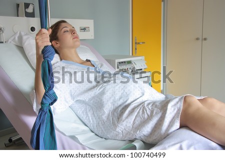 Young pregnant woman in a delivery room