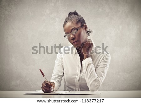 Writing black woman with a white shirt