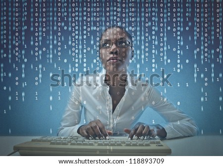 Black girl coding on the computer