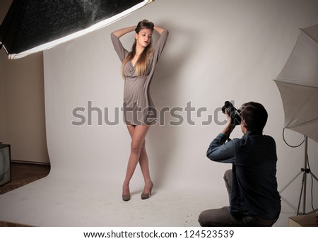 Young Boy, Bent Knees, Photographing A Model On A Set