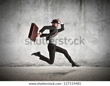 stressed businessman running