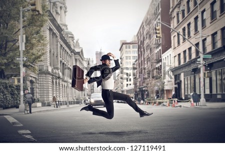 stressed businessman runs through the city