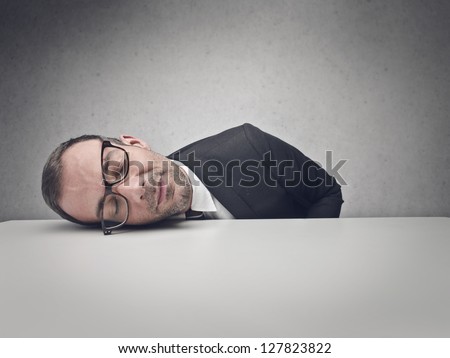 businessman sleeping on the table