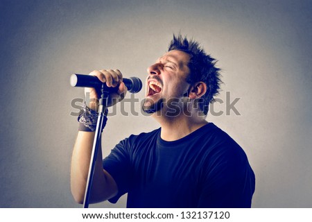 singer singing with microphone