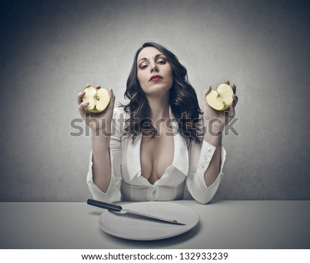 sensual woman with a cut apple