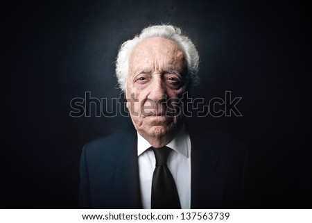 portrait of serious elderly businessman