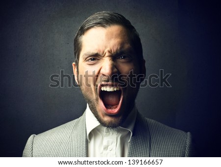 portrait of elegant man screaming