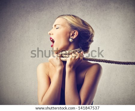 beautiful blonde woman screaming with fear