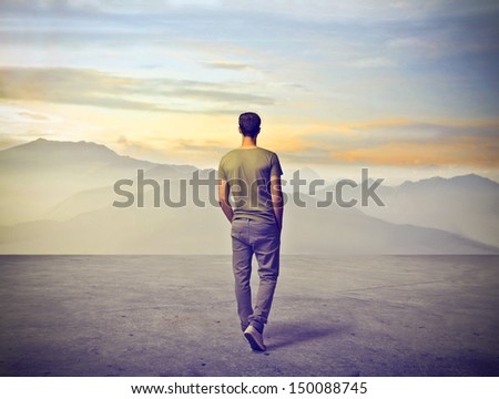 Young Man Walking Alone