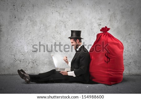 very rich businessman with big sack of money behind his back