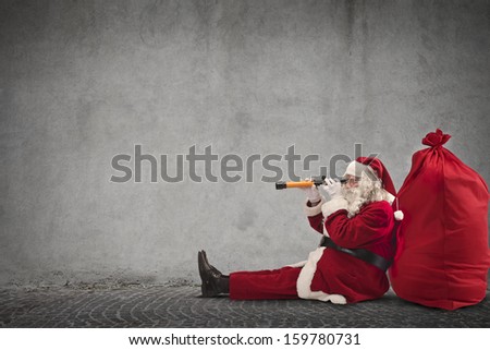 Santa Claus Sitting On The Floor Looking Through Spyglass