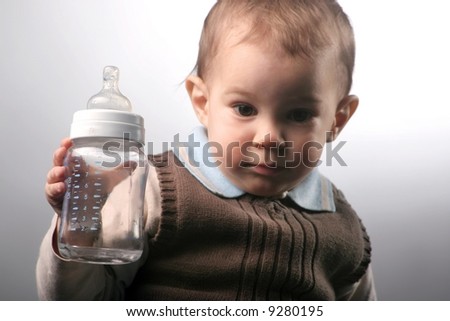 a child with a milk container