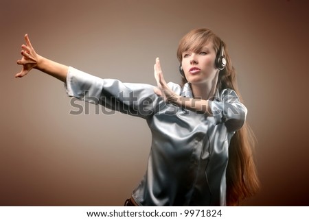 a young woman dance and  listen the music