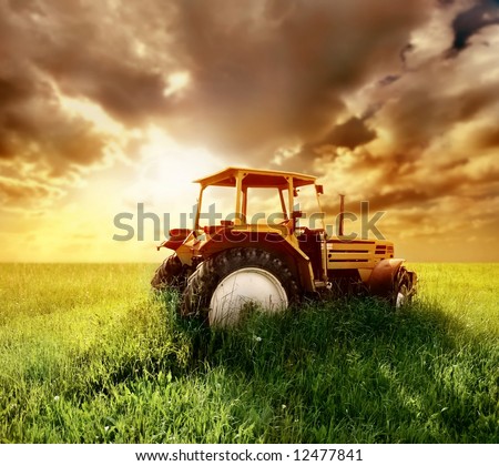old tractor on the grass field