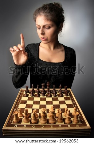 young woman with chess