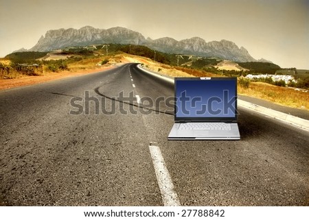 Laptop on a country road