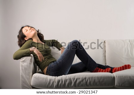 girl relaxing on a sofa