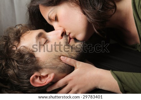 couple kissing. young couple kissing