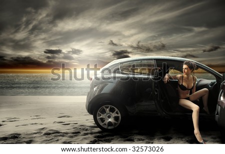 beautiful girl in bikini arriving on the beach with car