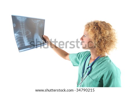 female doctor examining an x-ray of skeleton isolated