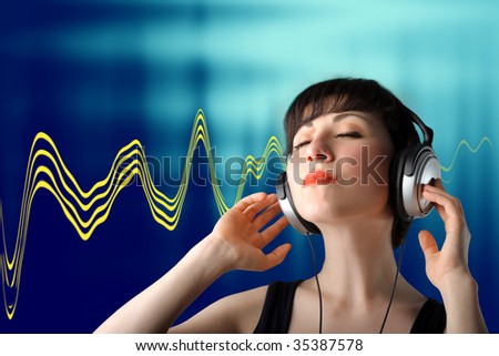 young woman listening music and sound vibrations