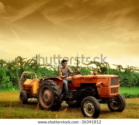 Farmer On Tractor
