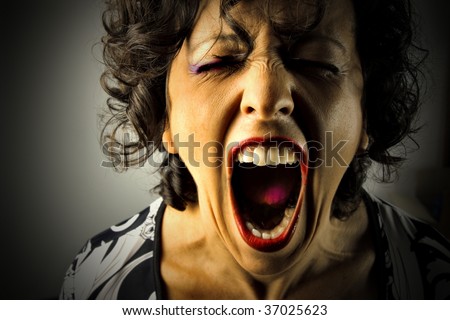 closeup of woman screaming