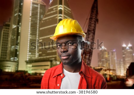 black man with hardhat construction yard