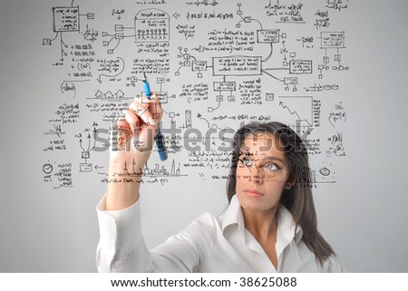woman drawing a  business system