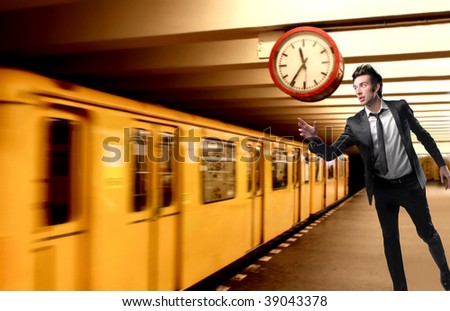 businessman loosing underground train