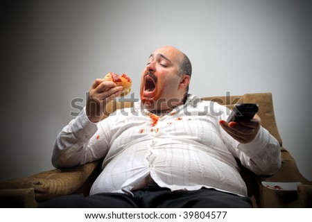 portrait of overweight man eating hamburger