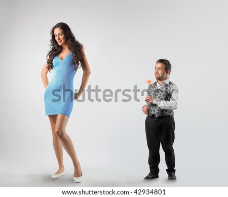 dwarf paying court to tall woman