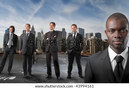 black businessman with a international staff on the background