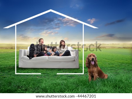 happy family and dog in the countryside dreaming a home
