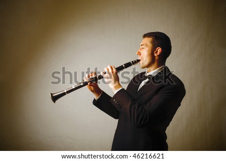 man playing clarinet