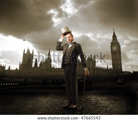 Portrait of a man in elegant suit standing in front of the Big Ben in London