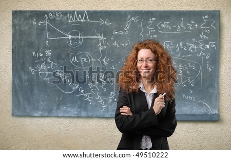 Smiling red haired teacher