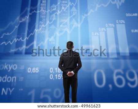 Businessman observing some statistics in front of him