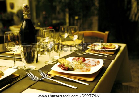 Restaurant table with dishes full of food