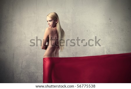 Beautiful woman with red tissue around her waist